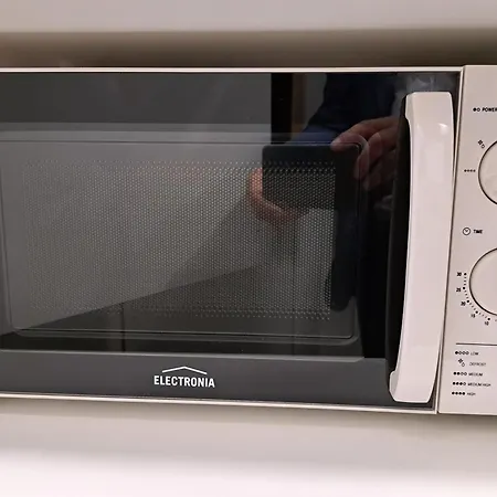 Airport - Std 2 - Ar Condicionado - Cave 20m2 215ft2 - Full Equipped - Ring Bell E